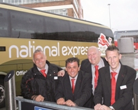 National Express coach drivers pose with the unique Games livery