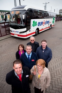 (Left to right) Richard Thomas of National Express, Mary Sullivan of the Newtown Association, driver Andrzej Wlodarczyk, Annmarie Lane and Paul Lane of the Newtown Association, and John Gibson of Cardiff City Council