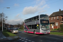 A new hybrid bus travelling on Service 18 between Manchester and Langley