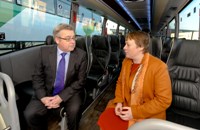 NX Coach MD Andrew Cleaves talks to Maria Eagle MP on a coach