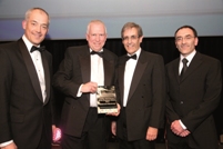 Pictured collecting the Large Business Award are Chris Bowles, Stagecoach Manchester managing director (second from left) and engineering director Peter Sumner (second from right)