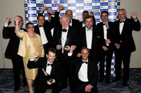 Pictured with the Customer Service Award at the Coventry Telegraph Business Awards 2012 is Mike de Courcey with members of the Travel de Courcey team
