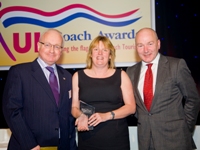 ROSCO’s John Miller (left) presents the inaugural ROSCO Award for Innovation in Road Safety to Kathy Tilbury at the UK Coach Awards 2012
