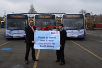 First Cymru General Manager Simon Cursio and driver Sharon Brown launch the new buses with a banner which says it all...