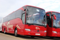 A Mercedes-Benz Tourismo in Redwing’s signature red livery