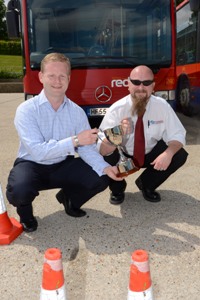Ed Wills (left) presents Stewart Richardson the regional competition cup