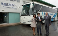 Phil Baker together with Justin He and Daphne Chen of Hino Travel