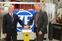 Production know-how for fiber-reinforced plastics material: ZF’s CEO Dr. Stefan Sommer (right) and Director Michael Hankel open the new ZF Composites Tech Centre at the Schweinfurt location