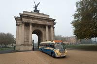The SB going through Wellington Arch in London. Is this a first for a vintage coach? LODGE COACHES