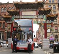 Stagecoach Manchester MD Chris Bowles is pictured with Depot Inspector Edmond Fan, creator of the special livery 