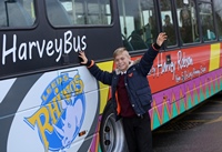 Harvey Robson with the bus sporting his design