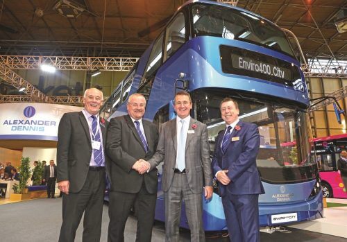 Sealing the deal: Phil Pannell, Yellow Buses’ Service Delivery Director (second left), with Colin Robertson, Chief Executive, Alexander Dennis Limited (second right); Arthur Whiteside, ADL’s Director of Sales, and Martin Brailey, ADL’s Regional Sales Director, in front of a E400 double-decker at Euro Bus Expo 2016.