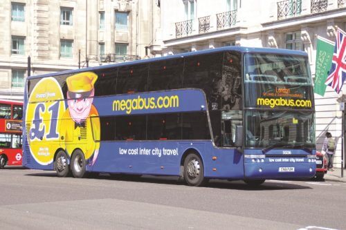 A megabus.com Van Hool TD927 Astromega is seen on Park Lane, London on April 20, 2016. MIKE SHEATHER