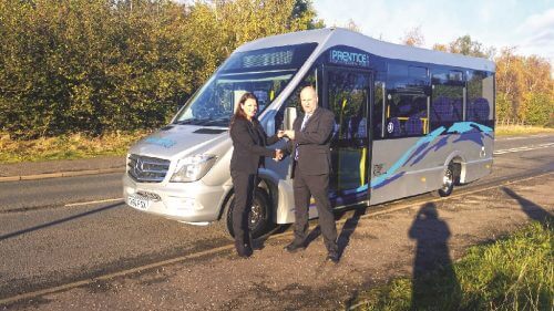 Lorna Miller, Mellor Coachcraft National Sales Manager, hands over the Strata keys to Ross Prentice