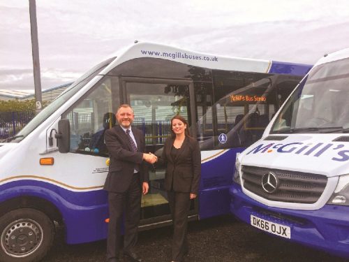 Ralph Roberts, Managing Director of McGills, receives the new Stratas from Lorna Miller, Mellor Coachcraft National Sales Manager