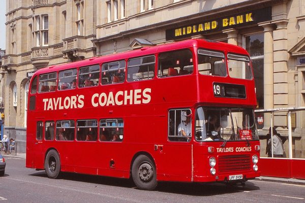 A coach-seated ECW-bodied Bristol VRT/SL3 new to Alder Valley in 1976, but previously operated by Keighley & District, is seen with Taylor’s Coaches of Morley in Morley during June 1992
