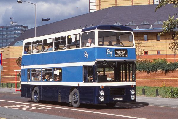 A Northern Counties-bodied Leyland Olympian new to the old established independent South Yorkshire Motors of Pontefract in 1984, is seen leaving Leeds for Doncaster during September 1992