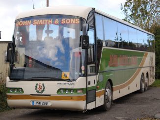 JSK268, a 2004 tri-axle MAN with Neoplan Euroliner bodywork. ADAM NICHOLSON