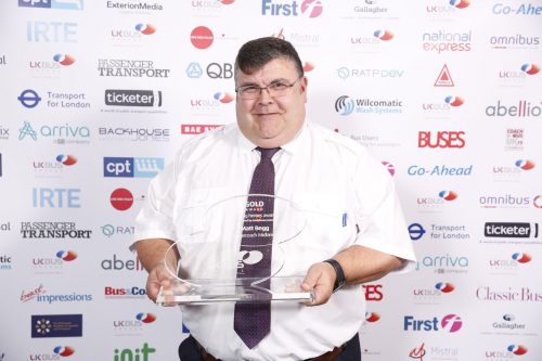 Matt Begg at the UK Bus Awards collecting the award for Unsung Hero