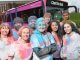 Brighton & Hove Buses' staff, Impetus volunteers and artist Lois O'Hara (centre) with the Citaro