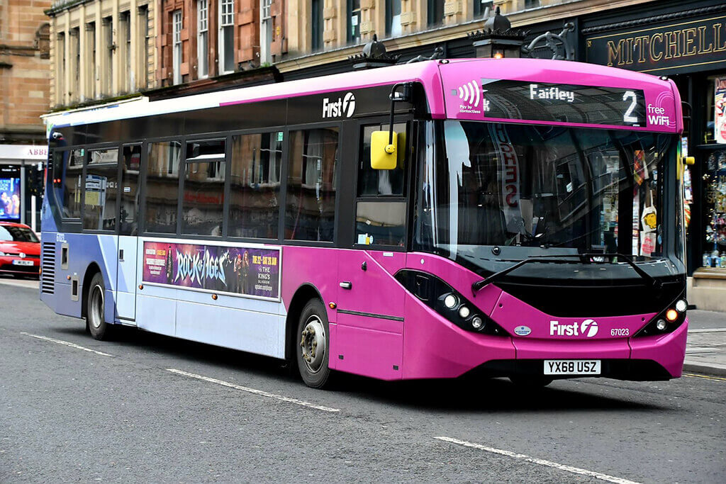 Heading for Faifley on route 2 is First Glasgow YX68USZ, an ADL Enviro200. 