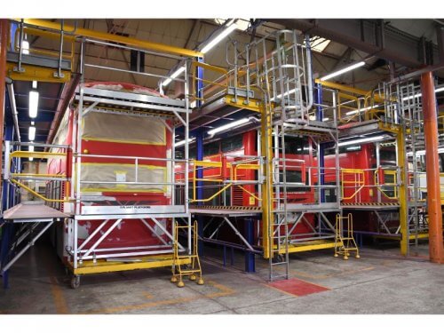 A three-bay gantry system built by Planet Platforms overcomes any working at height issues when preparing vehicles. ANDY IZATT