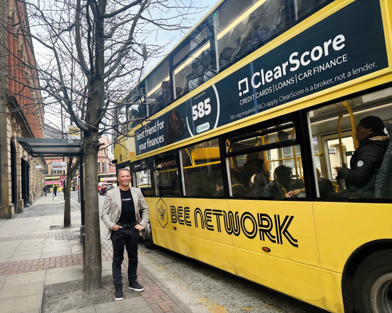 Snapper Services CEO Miki Szikszai with Bee Network Bus (Large)